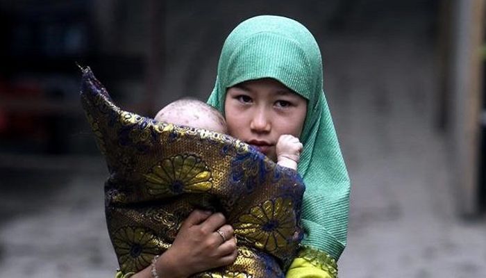 চীনে নির্যাতনের শিকার সংখ্যালঘু নারীরা