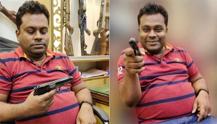 পিস্তল হাতে মৎস্যজীবী লীগ নেতার ছবি ভাইরাল